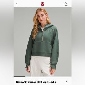 Lululemon scuba half zip hoodie, dark Forrest color with gold zipper.